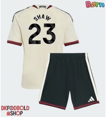 Manchester United Luke Shaw #23 Tredje trøje Børn 2026-27 Kort ærmer (+ korte bukser)